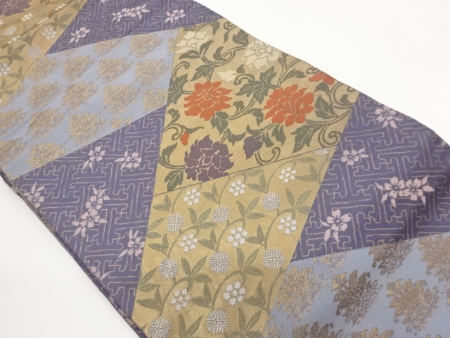 Nagoya obi woven with kirimetame-style floral arabesque pattern